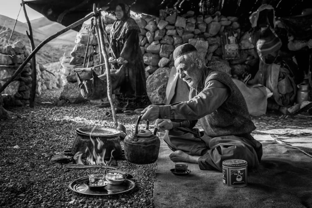Elder Pouring Tea by Mohammadreza Momeni — canvas wall art