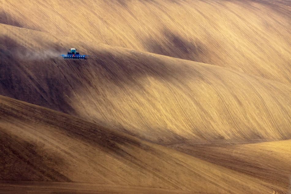 Tractor on Rolling Fields by Przemyslaw Kruk — canvas wall art