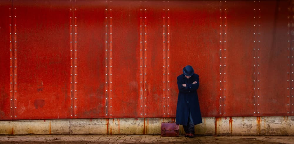 Pensive Man Red Wall by Ramiz Sahin — canvas wall art
