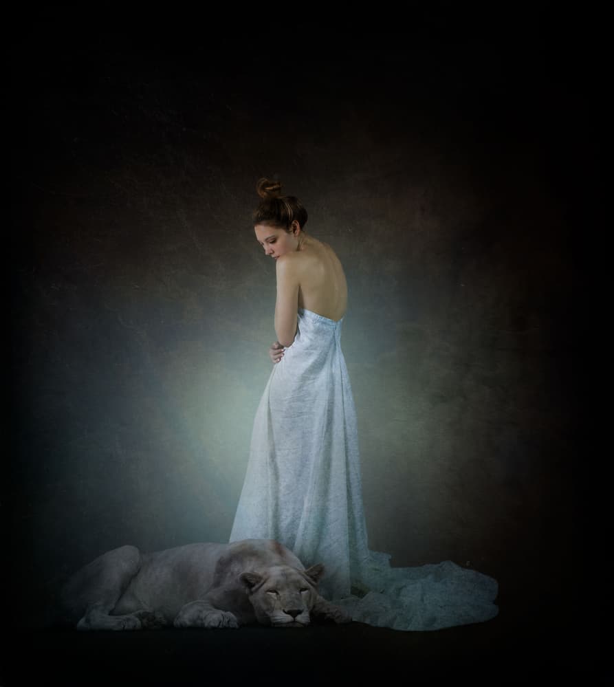 Serene Woman Sleeping Lion by Svetlana Melik-Nubarova — canvas wall art