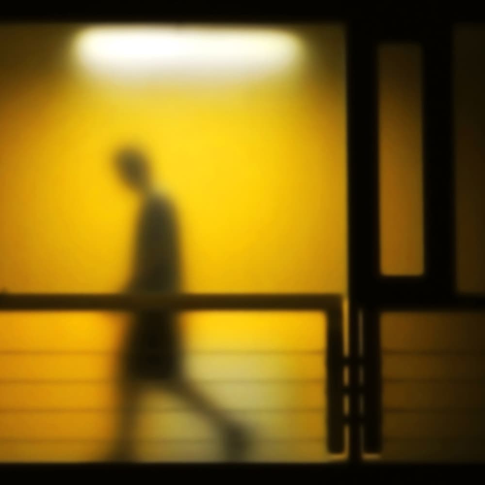 Solitary Figure Yellow Light by zsolo — canvas wall art