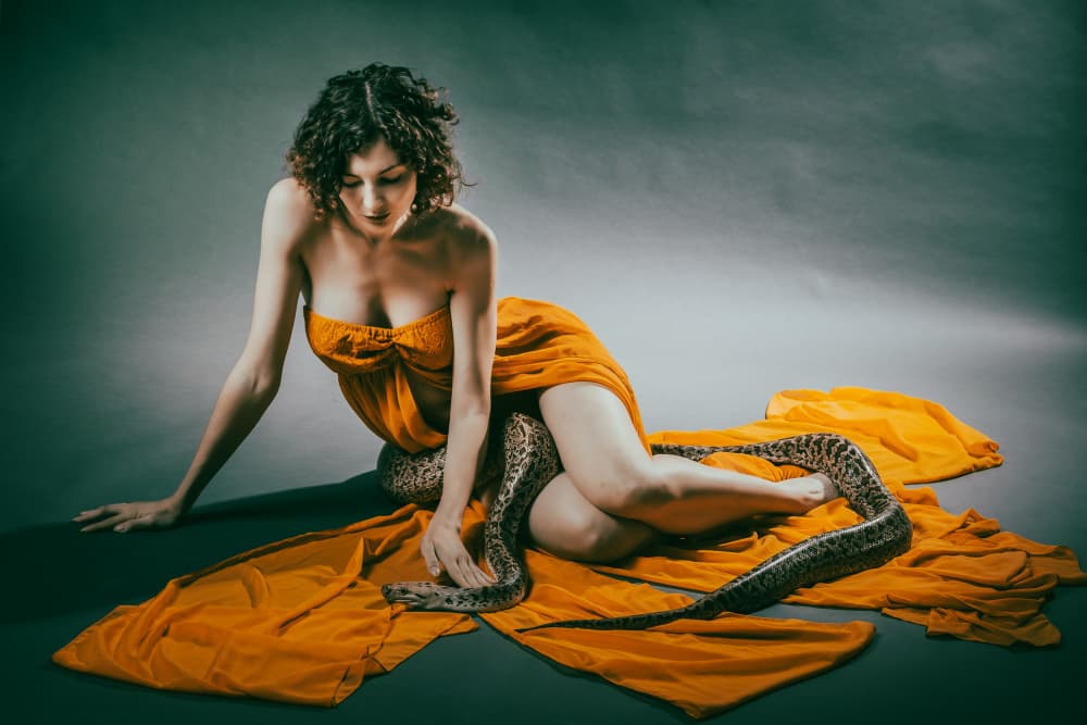 Elegant Woman and Snake by MAZAL TOV MATTY OZERI — canvas wall art
