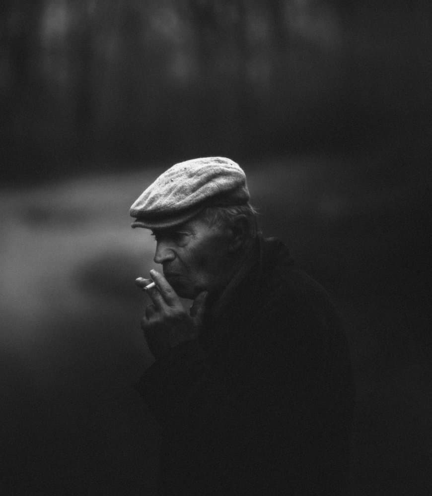 Thoughtful Man Smoking by Koki Jovanovic — canvas wall art