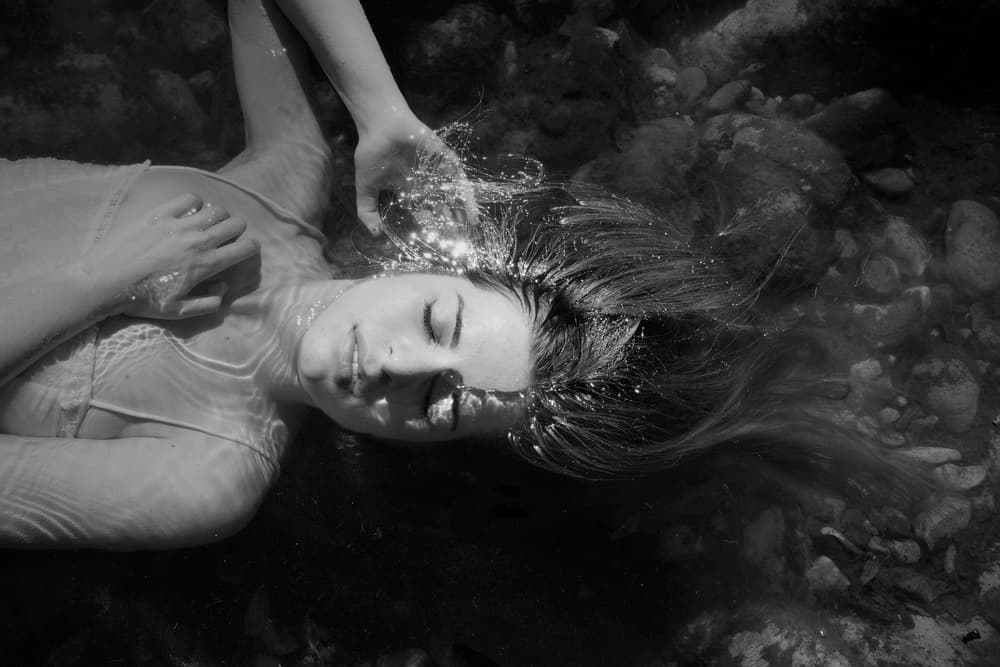 Serene Woman Floating by Olga Mest — canvas wall art