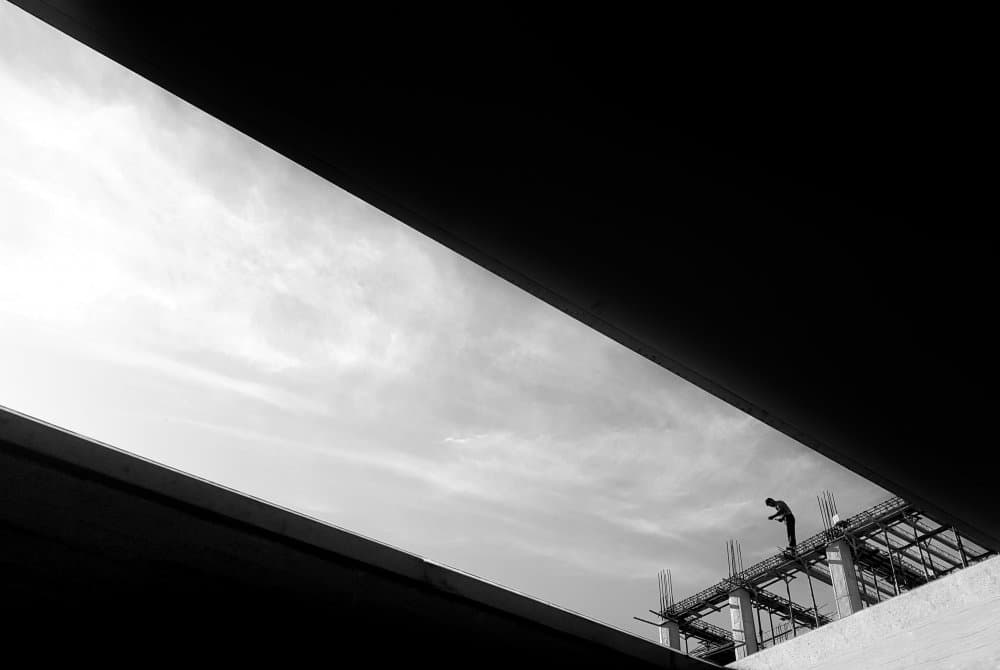Construction Worker Silhouette by Mohammad Fotouhi — canvas wall art