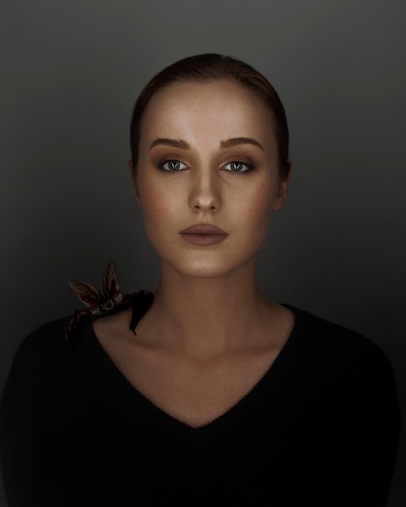 Mysterious Woman and Bat by marinastudio — canvas wall art