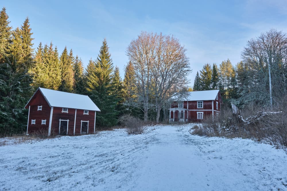 Snowy Red Barn and House by Geertjan Plooijer — canvas wall art