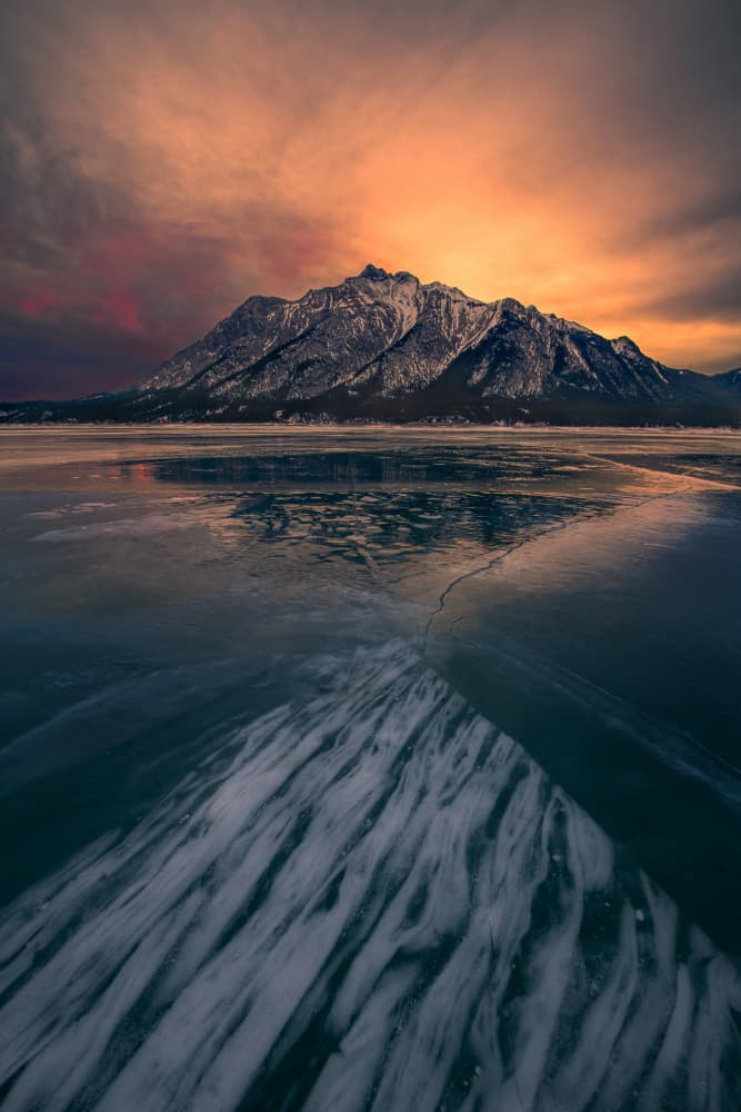 Frozen Lake Mountain Sunset by Leah Xu — canvas wall art