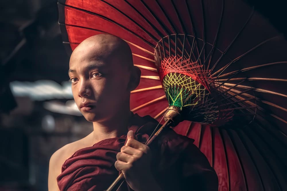 Young Monk Red Umbrella by Roberto Rivera — canvas wall art