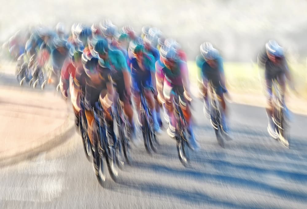 Speeding Cyclists Blur by Lou Urlings — canvas wall art