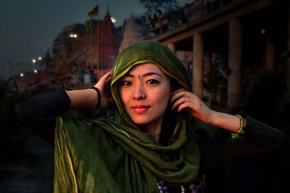 Japanese tourist in Varanasi by Irene Perovich — canvas wall art