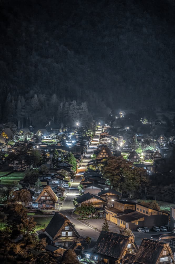 Traditional Village Night Glow by まちゅばら/Hiroki Matsubara — canvas wall art