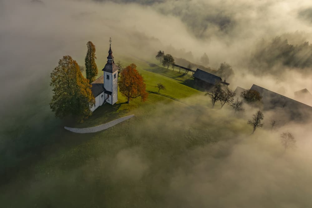 Misty Autumn Church by Jure Kravanja — canvas wall art