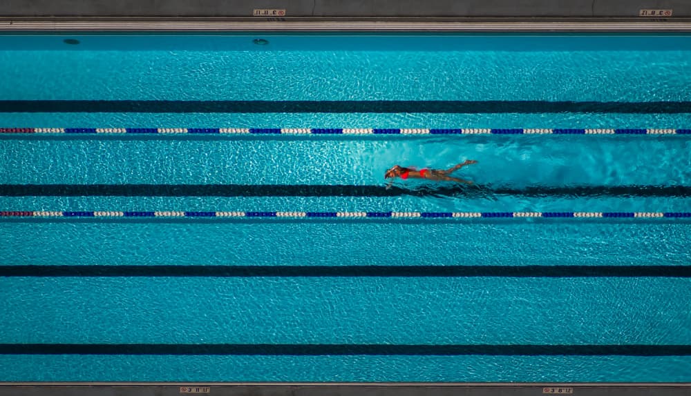 Pool Swimmer Overhead by Marek Lapa — canvas wall art