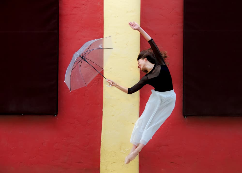 Joyful Umbrella Dance by Ken Liang — canvas wall art