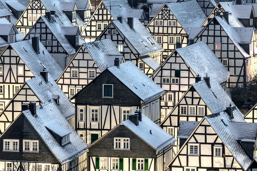 Snowy Half-Timbered Houses by Thomas Siegel — canvas wall art