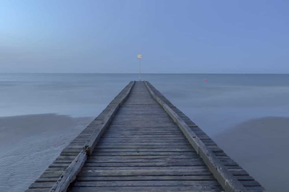 Pier to the Horizon by Emanuela Sol — canvas wall art
