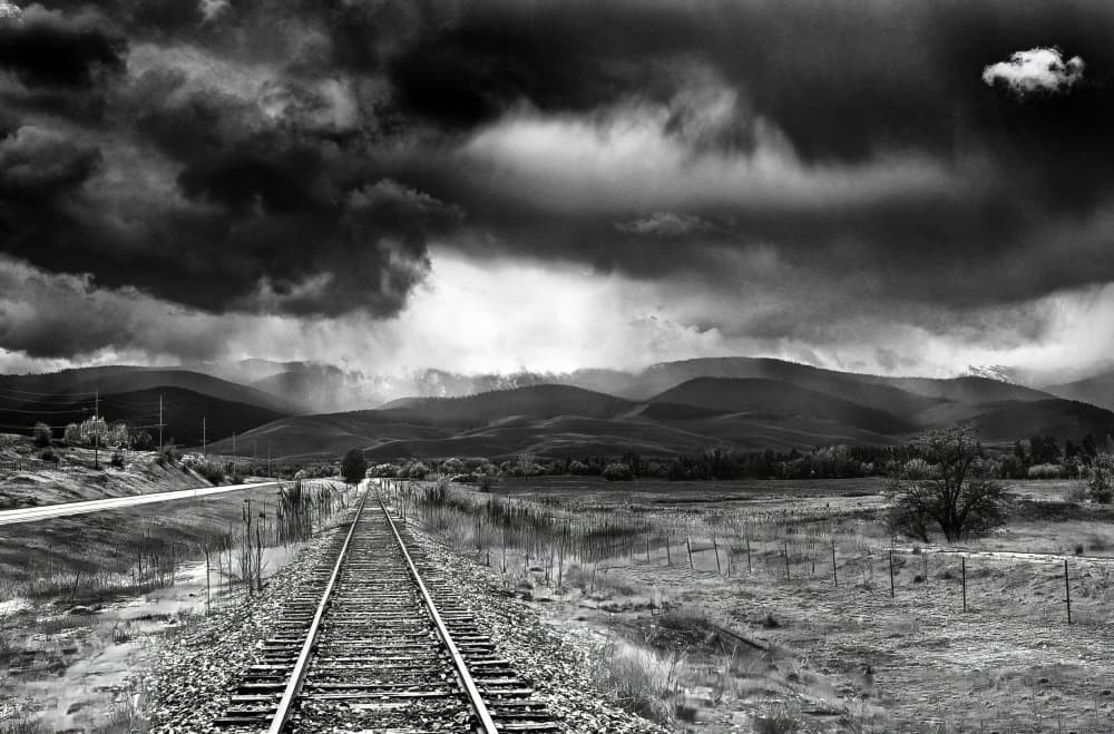 Tracks Under Stormy Skies by Porter Thomas — canvas wall art
