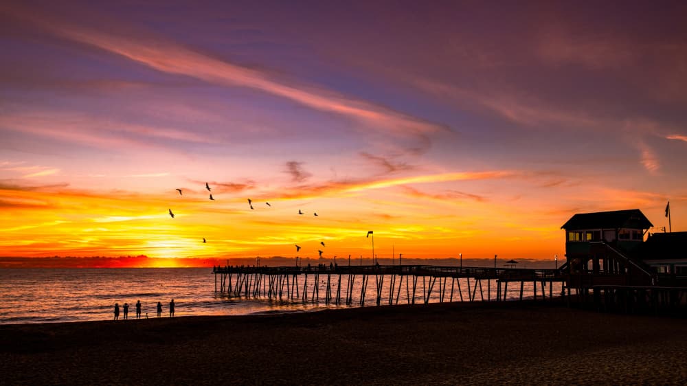 Vibrant Pier Sunset by Wenjin Yu — canvas wall art