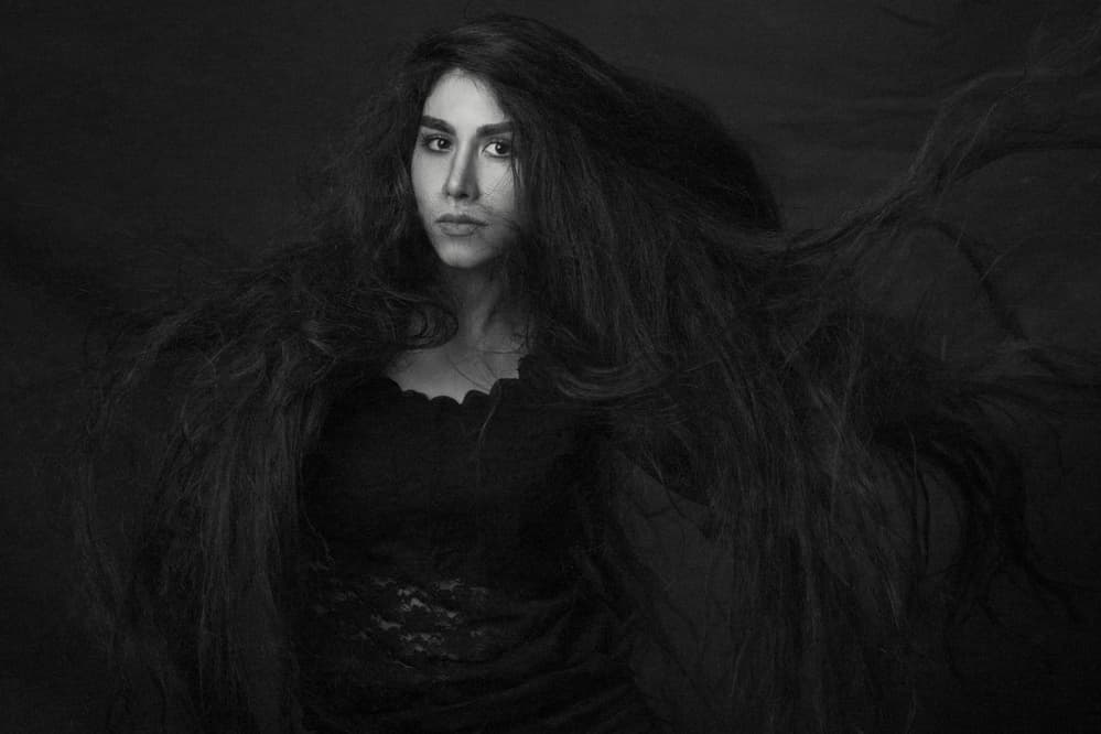 Flowing Dark Hair Woman by Mehdi Mokhtari — canvas wall art