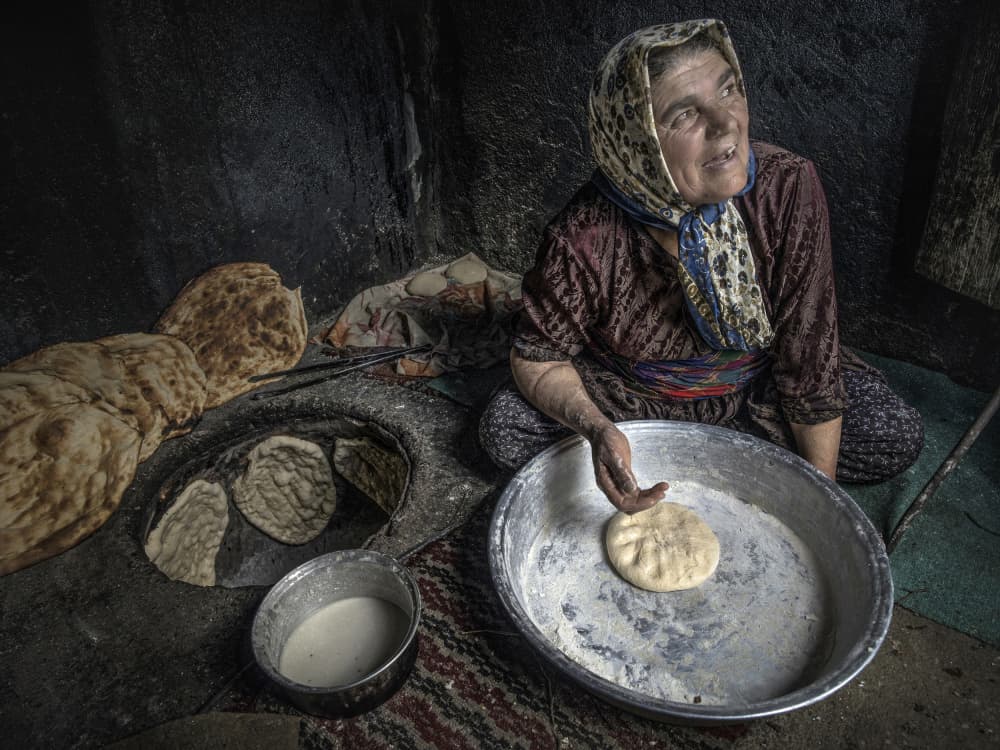 Traditional Bread Making by Abbas Arabzadeh — canvas wall art