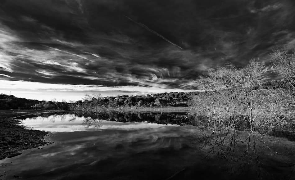 Dramatic Lake Reflection by Raul Pires Coelho — canvas wall art