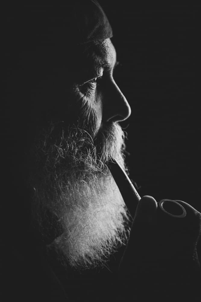 Pensive Man with Pipe by M. Emre Erol — canvas wall art