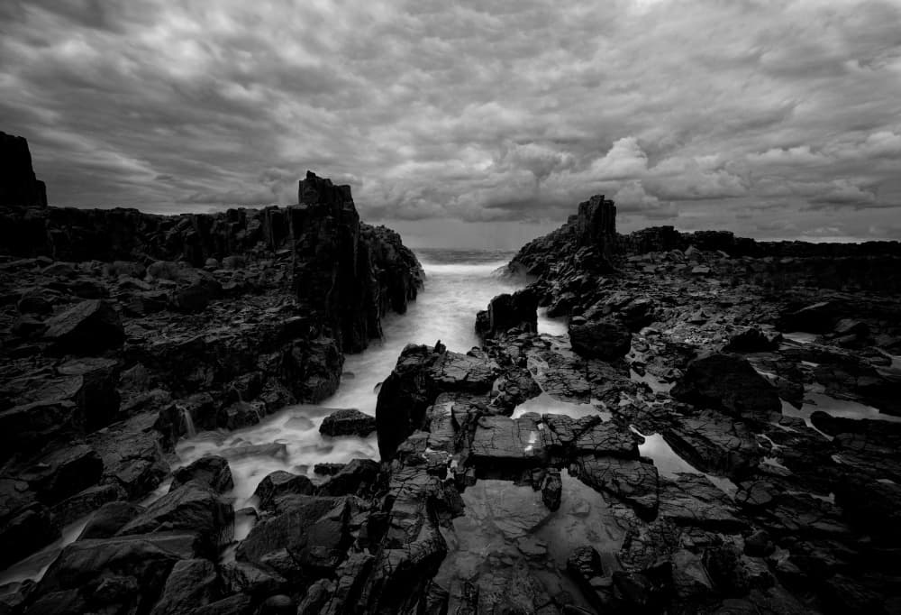 Stormy Rocky Coast by Ashley Sowter — canvas wall art