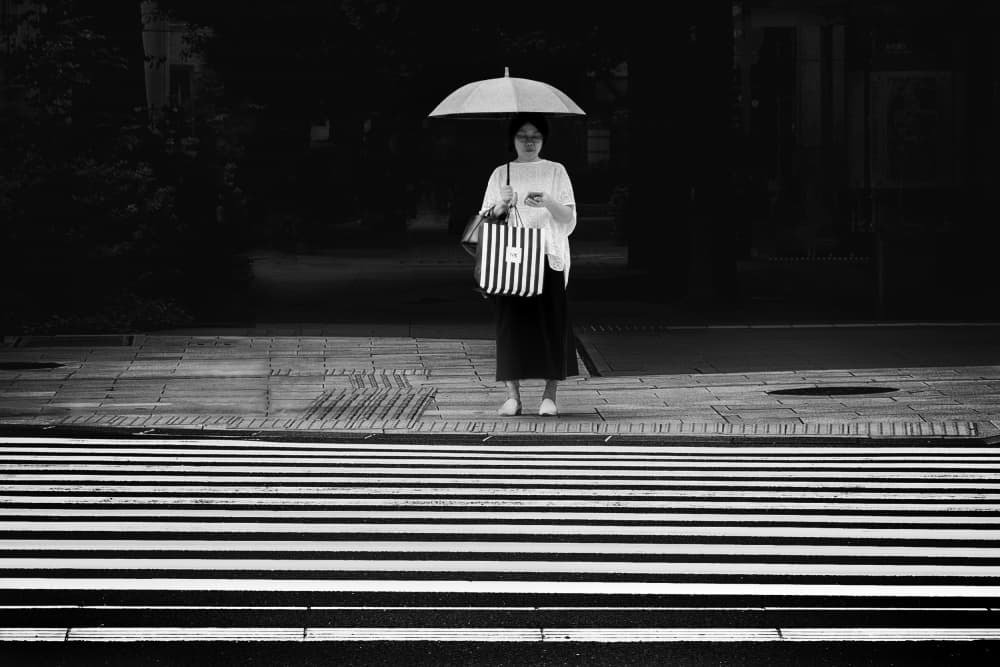 Woman Waiting at Crosswalk by Eiji Yamamoto — canvas wall art