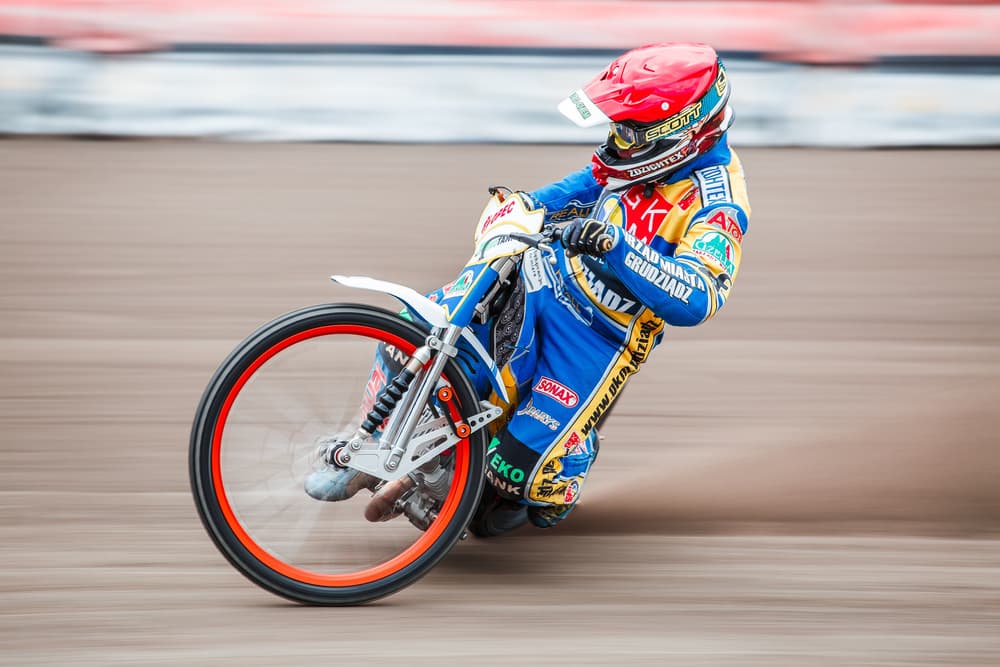 Speedway Racer Leaning by Wojciech Łączkowski — canvas wall art