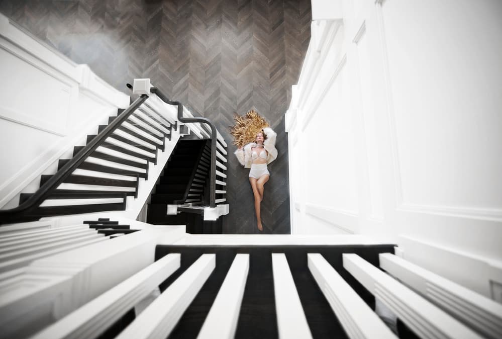 Elegant Woman Grand Staircase by Carmit Rozenzvig — canvas wall art
