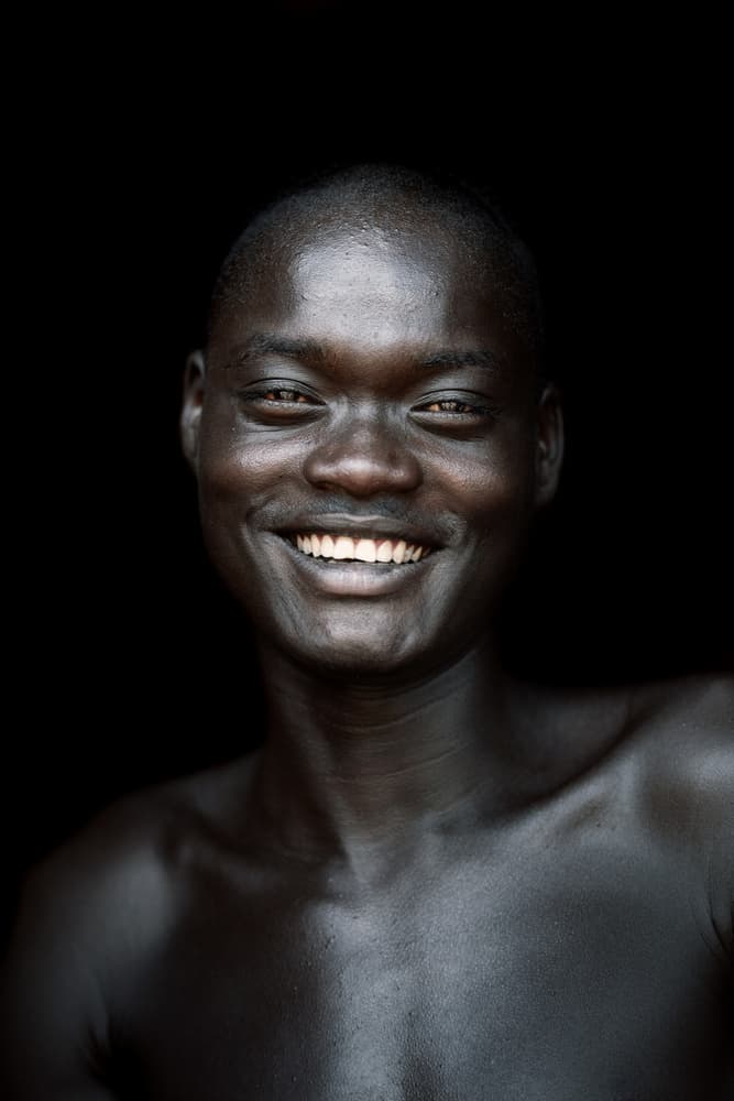 Joyful Dark Skin Smile by Trevor Cole — canvas wall art