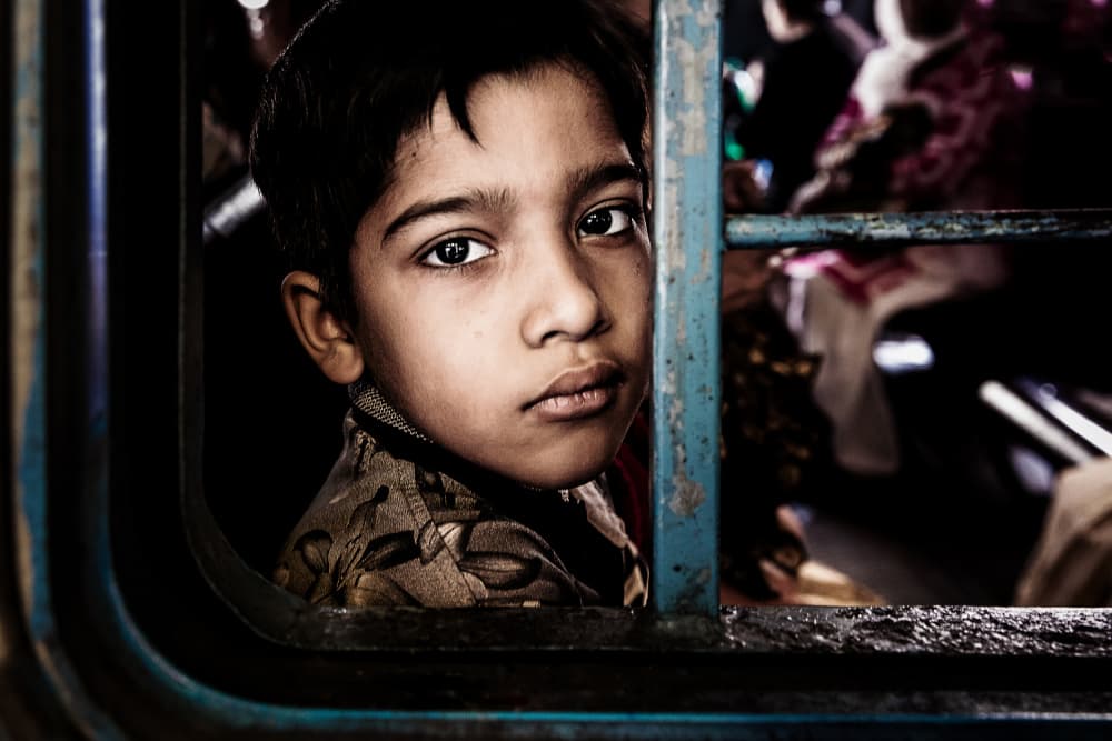 Boy by Train Window by Gloria Staffa — canvas wall art