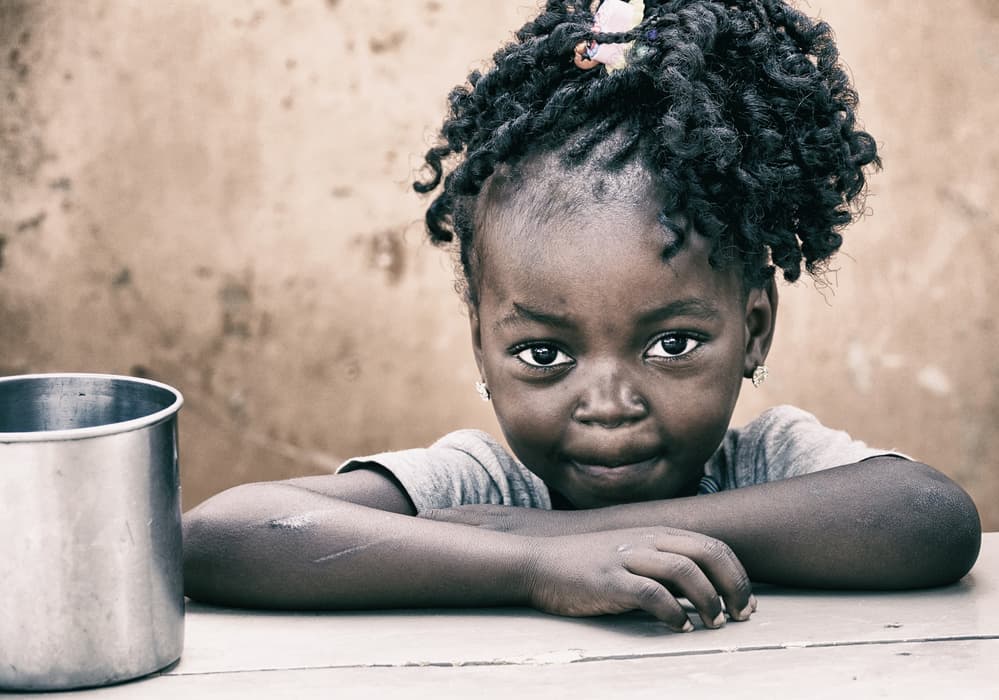 Child's Earnest Gaze by Elena Molina — canvas wall art