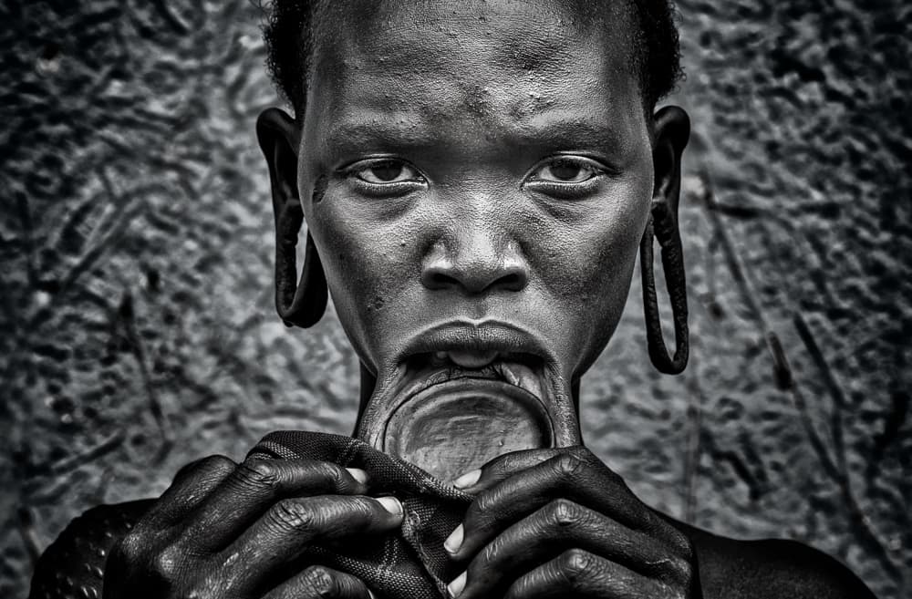 Mursi Woman Lip Plate by Joxe Inazio Kuesta Garmendia — canvas wall art