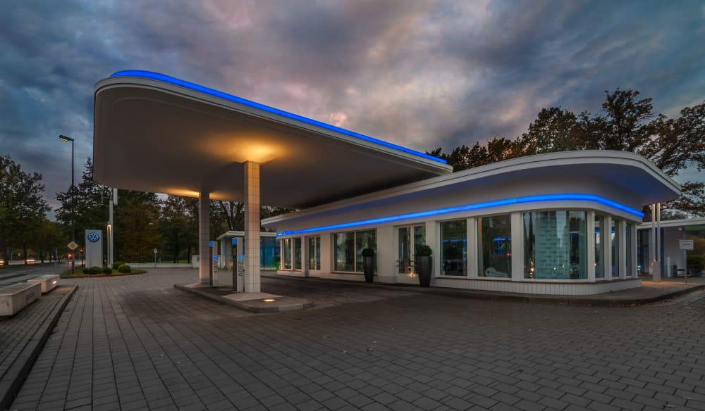 Sleek Blue Gas Station by Hans Günther — canvas wall art