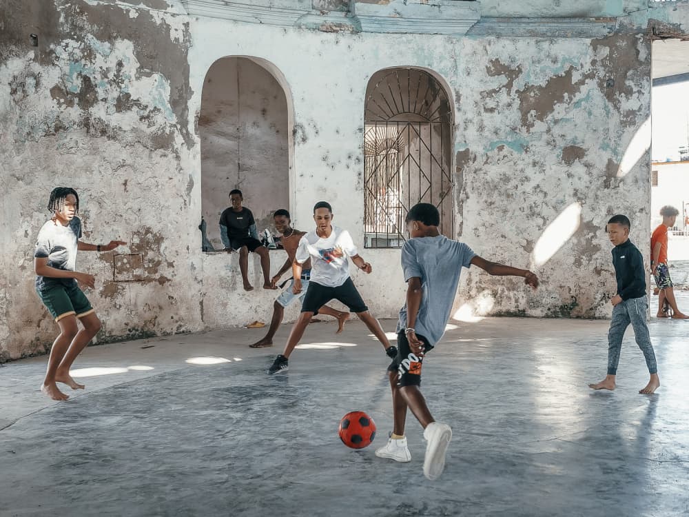 Street Soccer Game by Andy Bauer — canvas wall art
