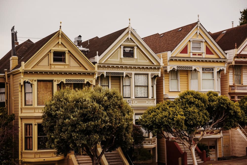 Colorful Victorian Homes by Del Mundo Imagery — canvas wall art