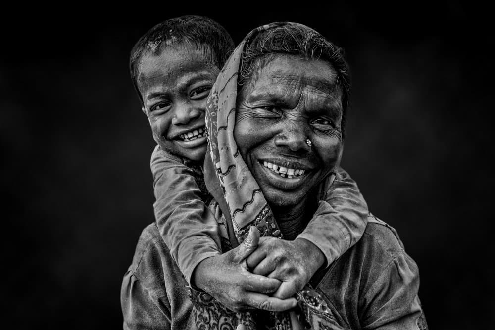 Joyful Woman and Child by JOYRAJ SAMANTA — canvas wall art