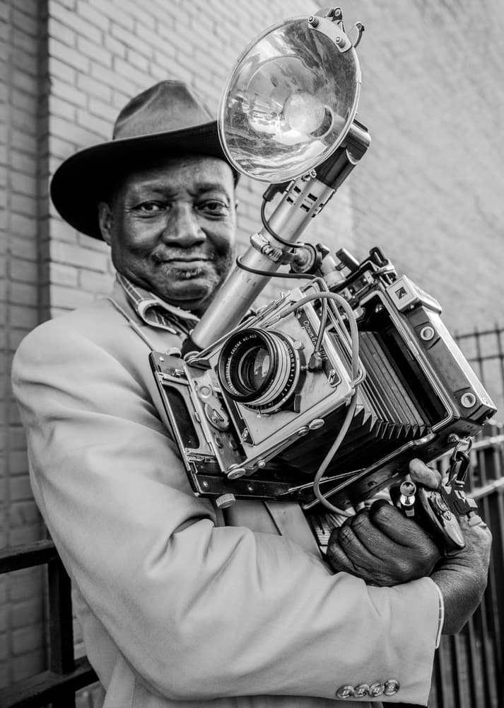 Smiling Photographer Vintage Camera by Hans ML Spiegel — canvas wall art