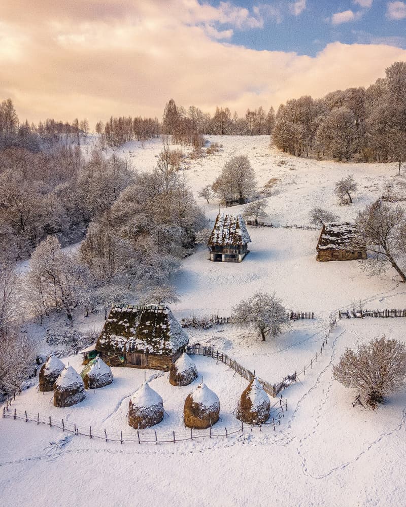 Rustic Winter Village by Carmen Barna — canvas wall art