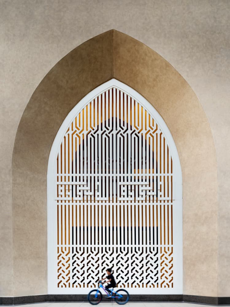 Geometric Arch and Cyclist by Moath Alhamed — canvas wall art
