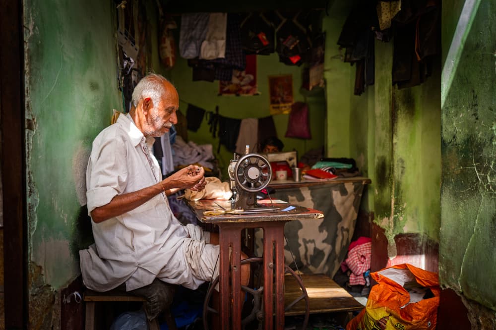 Traditional Tailor At Work by Martin Froyda — canvas wall art