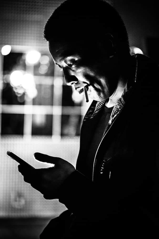 Smoking Man And Phone by TORU MATSUNAGA — canvas wall art