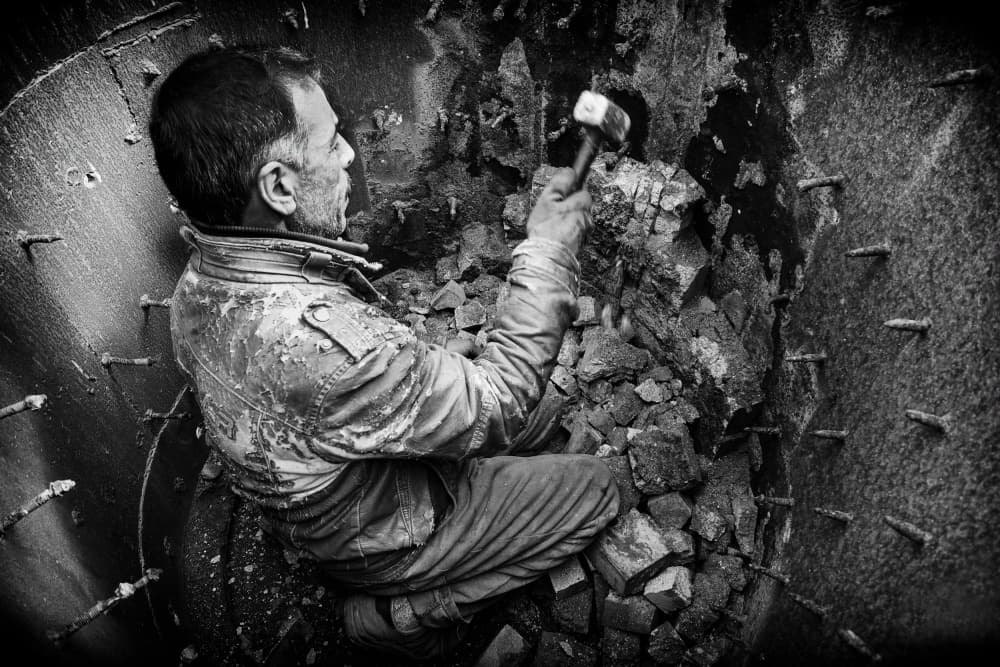 Manual Labor Breaking Coal by Jalili — canvas wall art