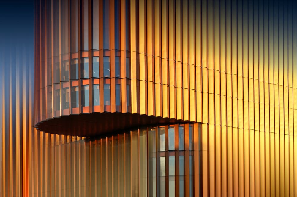Golden Facade Reflections by Erhard Batzdorf — canvas wall art