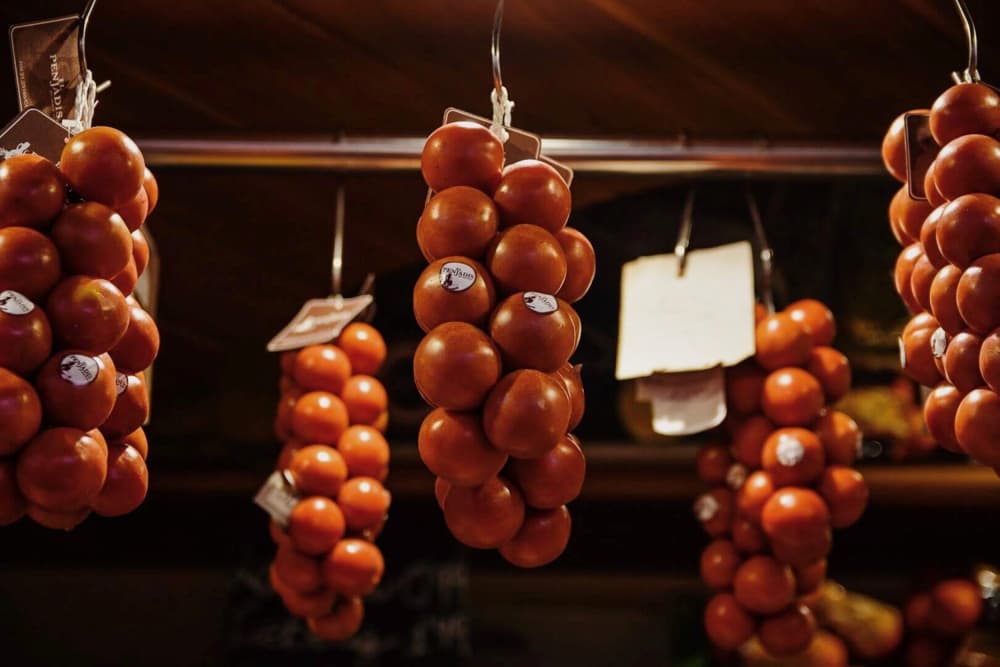 Hanging Market Tomatoes by Del Mundo Imagery — canvas wall art