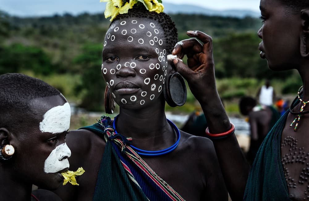 African Tribal Face Paint by Joxe Inazio Kuesta Garmendia — canvas wall art