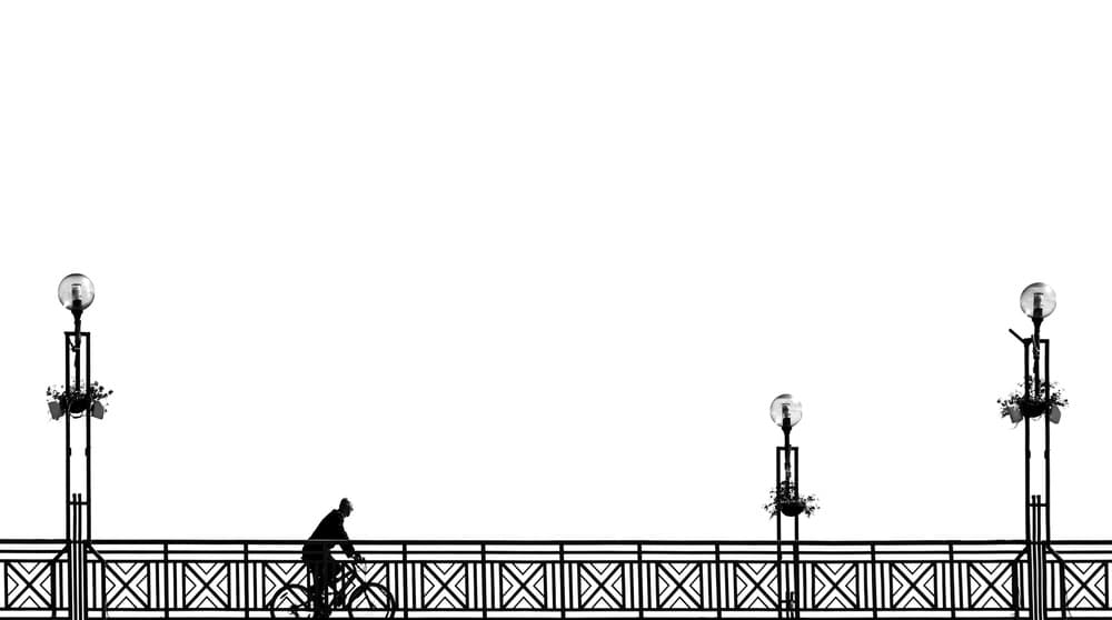 Cyclist on Bridge Silhouette by Samir Pajic — canvas wall art