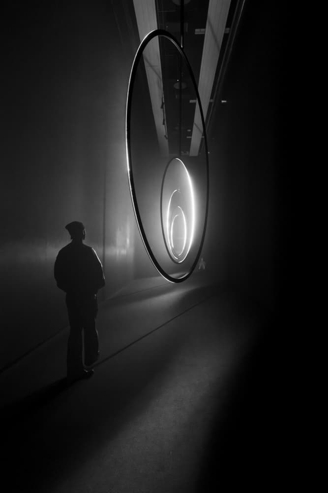 Silhouetted Figure Light Rings by Fernando Coelho — canvas wall art